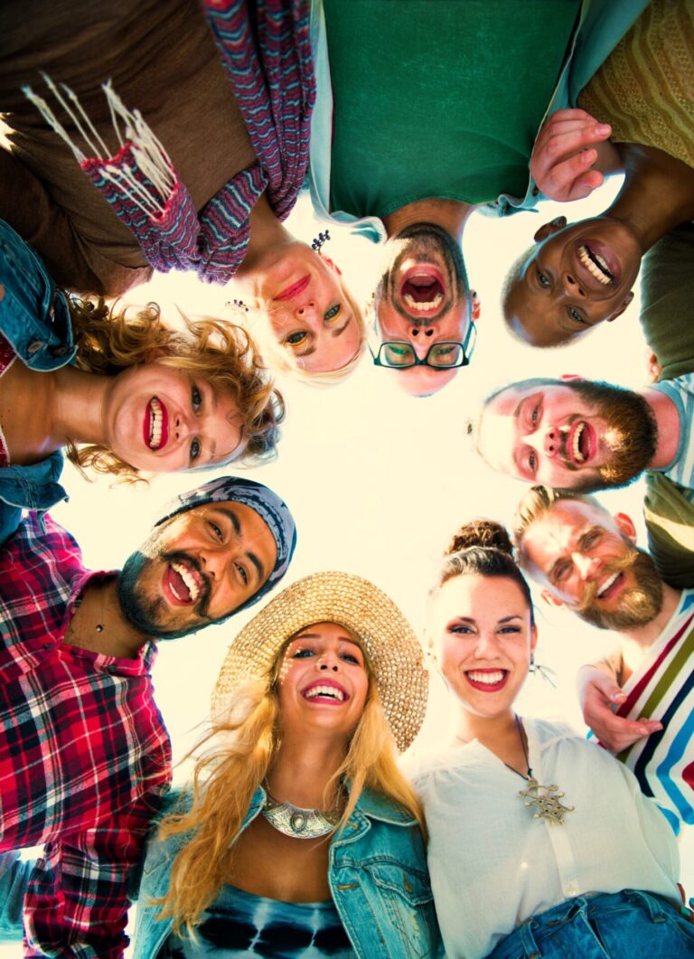 Friends Huddle Join Holiday Party Group Concept